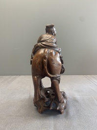 A pair of Chinese carved bamboo groups of a boy riding a buffalo, 19/20th C.