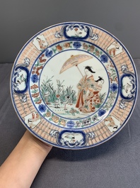 A Japanese Imari 'Parasol Ladies' plate after Cornelis Pronk, Edo, 18th C.