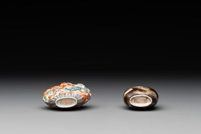 A Chinese famille rose molded 'Buddhist lions' and a grisaille 'dragon' snuff bottle, Qianlong and Daoguang mark, 19th C.