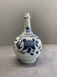 Three Japanese blue and white Arita 'birds among flowering branches' pharmacy bottles, Edo, 18th C.