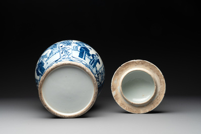 A pair of Chinese blue and white vases and covers with figural panels, 19th C.
