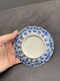 Six Chinese blue and white 'acupuncture' saucers, Kangxi