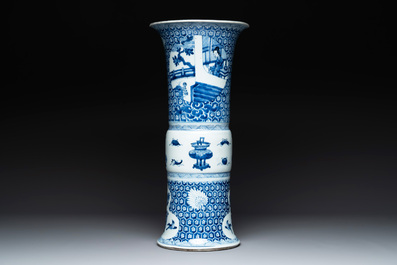 A Chinese blue and white 'gu' vase with a lady and antiquities, Kangxi