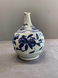 Three Japanese blue and white Arita 'birds among flowering branches' pharmacy bottles, Edo, 18th C.