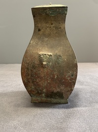 A Chinese bronze ritual wine vessel and cover, 'fang hu 方壺', Warring States Period