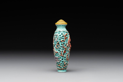 A Chinese moulded turquoise-ground famille rose 'dragon and phoenix' snuff bottle, 19th C.
