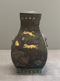 A rare Chinese archaic partially gilt bronze ritual wine vessel and cover, 'fang hu 方壺', Han