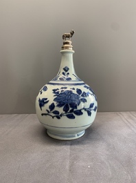 Three Japanese blue and white Arita 'birds among flowering branches' pharmacy bottles, Edo, 18th C.