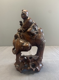 A pair of Chinese carved bamboo groups of a boy riding a buffalo, 19/20th C.