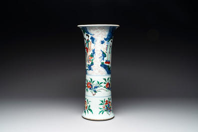 A Chinese wucai 'gu' vase with narrative design, Transitional period