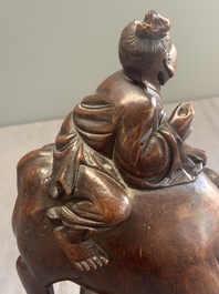 A pair of Chinese carved bamboo groups of a boy riding a buffalo, 19/20th C.