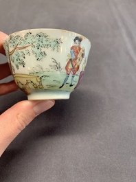 A Dutch-decorated Chinese porcelain cup and saucer with figures in a landscape, 18th C.