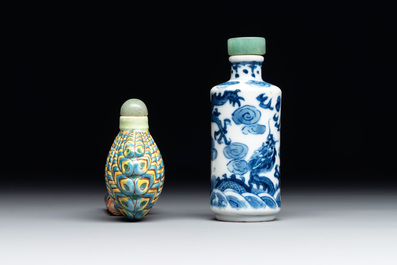 A Chinese blue and white 'dragon' snuff bottle and a polychrome 'peacock' snuff bottle, Yongzheng mark, 19/20th C.