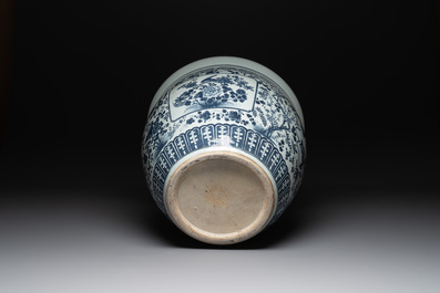 A large Chinese blue and white fish bowl with birds, deer, insects and flowering branches, 19th C.