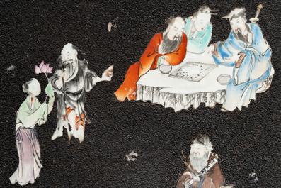 A pair of Chinese famille rose black-gravel-ground plaques, Jiaqing