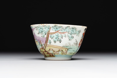 A Dutch-decorated Chinese porcelain cup and saucer with figures in a landscape, 18th C.