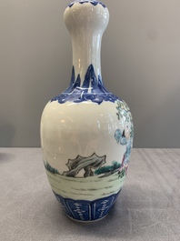 A Chinese famille rose '100 boys' garlic-mouth vase, Qianlong mark, 19th C.