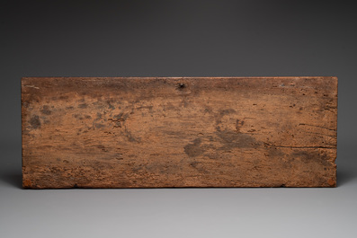 A carved walnut panel depicting the victory of good over evil, 16th C.