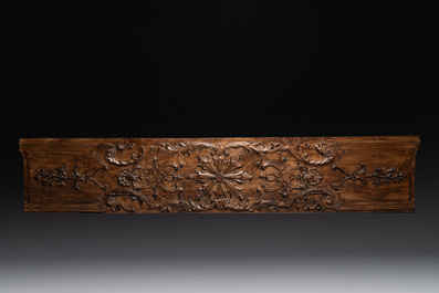 Two ornately carved pine and walnut panels, France, 18th C.
