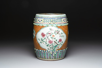 A Chinese famille rose garden seat with birds among flowering branches, 19th C.