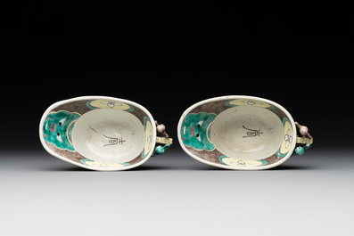 A pair of fine Chinese sancai-glazed 'Buddhist lion and chilong' libation cups, Kangxi
