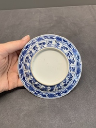 Six Chinese blue and white 'acupuncture' saucers, Kangxi