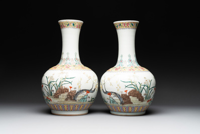 A pair of Chinese famille rose bottle vases with flowers, Qianlong mark, Republic