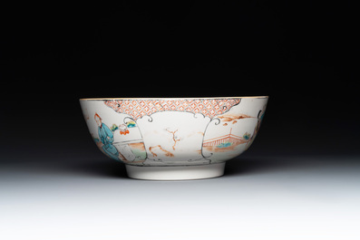 A Chinese Canton famille rose bowl with figures in a garden, Qianlong