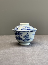A Chinese blue and white 'figures and a phoenix' tea bowl and cover, Yongzheng