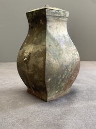 A Chinese bronze ritual wine vessel and cover, 'fang hu 方壺', Warring States Period