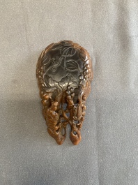 A rare Chinese carved rhinoceros horn 'libation cup' with grape design, 17/18th C.