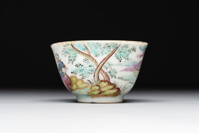 A Dutch-decorated Chinese porcelain cup and saucer with figures in a landscape, 18th C.