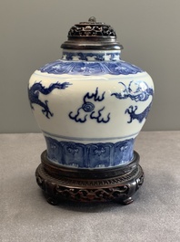 A Chinese blue and white 'dragon' vase with wooden cover and stand, Wanli mark, Republic