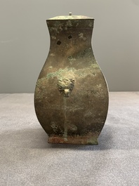 A Chinese bronze ritual wine vessel and cover, 'fang hu 方壺', Warring States Period