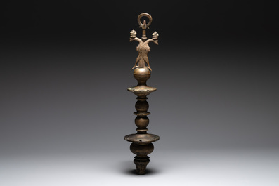 A bronze lustre stem with a double-headed crowned eagle, Flanders, 16th C.
