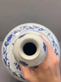 A Chinese blue and white bottle vase with floral sprigs, Transitional period