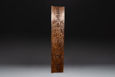 Two ornately carved pine and walnut panels, France, 18th C.