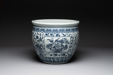 A large Chinese blue and white fish bowl with birds, deer, insects and flowering branches, 19th C.