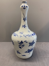 A Chinese blue and white bottle vase with floral sprigs, Transitional period