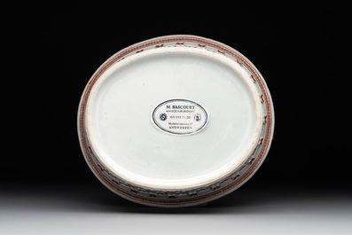A Chinese openworked famille rose 'antiquities' basket and stand, Qianlong