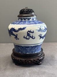 A Chinese blue and white 'dragon' vase with wooden cover and stand, Wanli mark, Republic