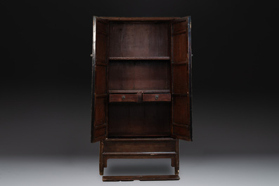 A large Chinese lacquered tapered round-corner cabinet, 'yuanjiaogui', Ming, 16/17th C.