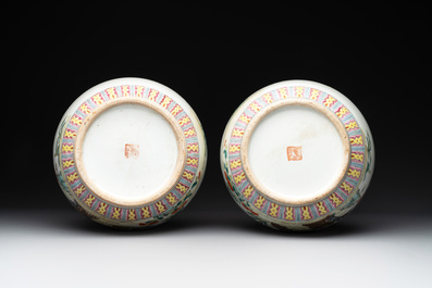 A pair of Chinese famille rose bottle vases with flowers, Qianlong mark, Republic