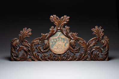 Two ornately carved decorative panels and a niche with an embroidered scene, France, 16/18th C.