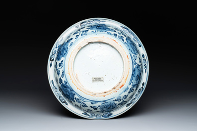 A Chinese blue and white 'phoenix and peonies' dish, Hongzhi/Zhengde