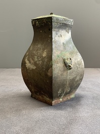 A Chinese bronze ritual wine vessel and cover, 'fang hu 方壺', Warring States Period