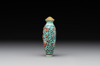 A Chinese moulded turquoise-ground famille rose 'dragon and phoenix' snuff bottle, 19th C.