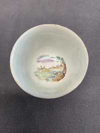 A Dutch-decorated Chinese porcelain cup and saucer with figures in a landscape, 18th C.
