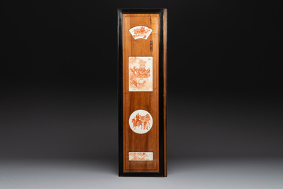 A Chinese four-part folding screen with iron-red-decorated porcelain plaques, 19/20th C.