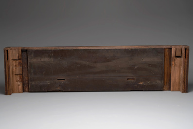 A carved front panel of a Gothic walnut chest with female saints, alcoves and rosettes, France, early 16th C.
